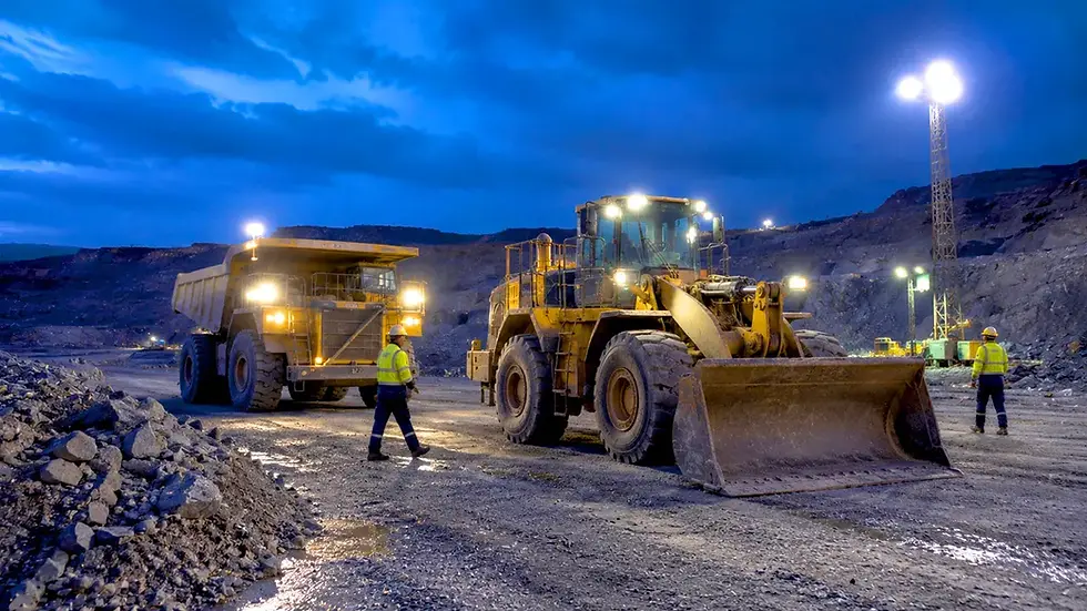 Surface mine shift change with equipment and workers illustrating pedestrian detection systems for mining during peak exposure periods