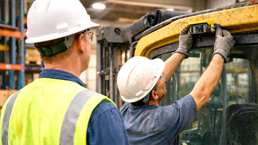 Fleet manager observing 360° AI vision system for heavy equipment installation on a single forklift during a site validation pilot