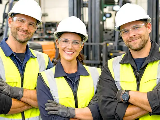 Three mechanics in the Riodatos pedestrian detection system installation program