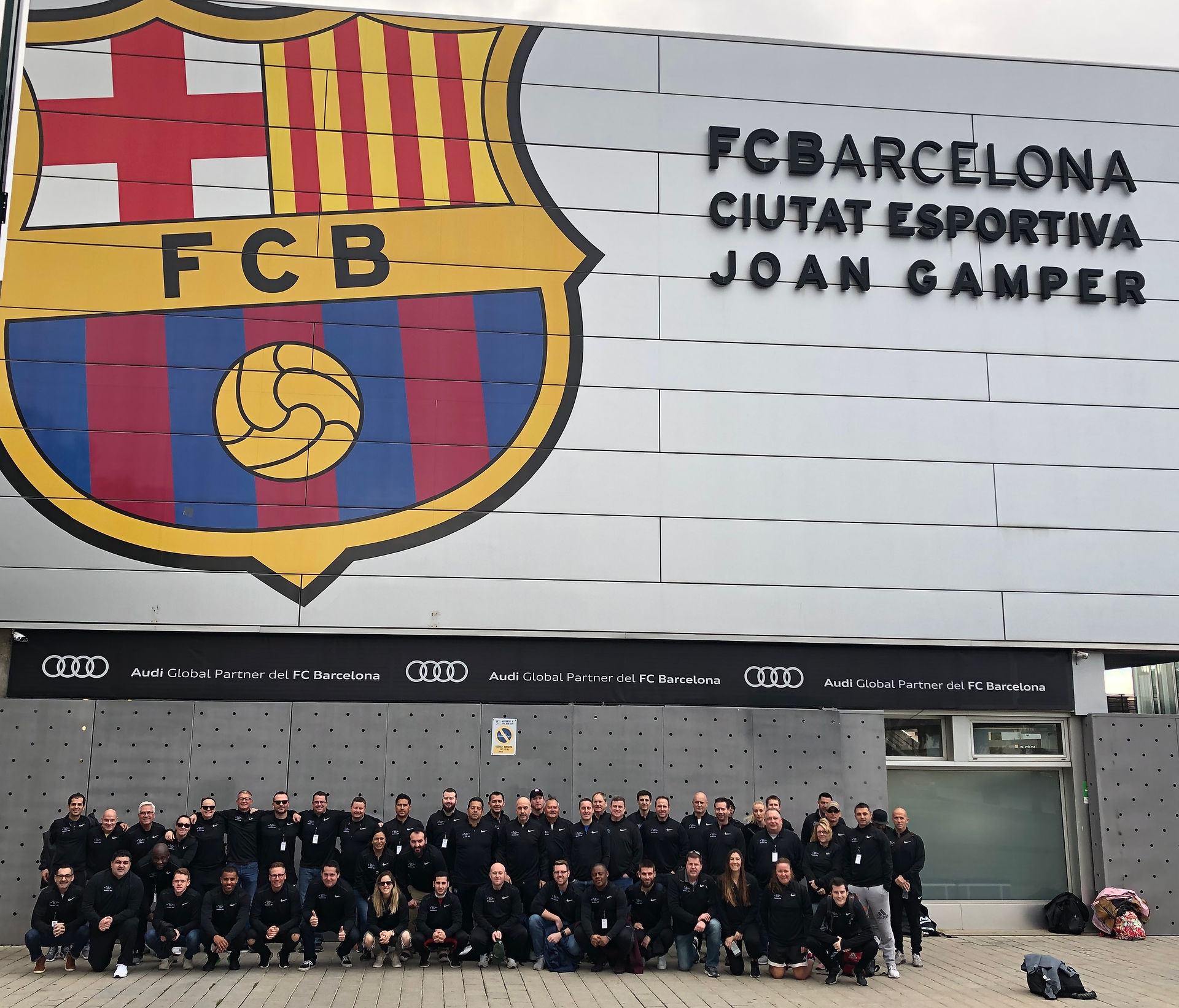 Group in front of FCB training facilitie