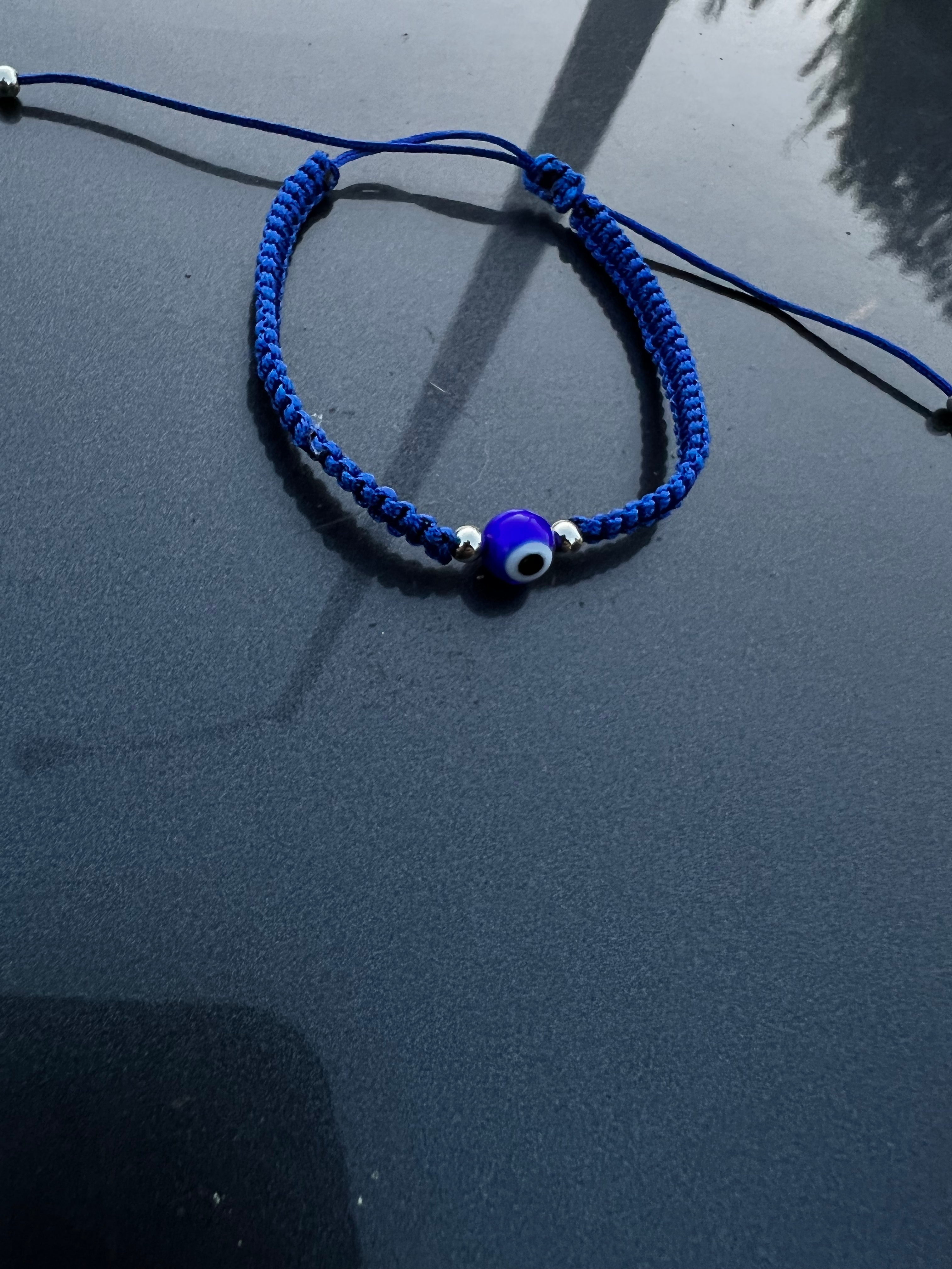 Mal de ojo protección en hilo azul