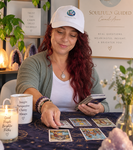 Carmel-Anne of Soulfully Guided reading tarot cards during an intuitive tarot reading