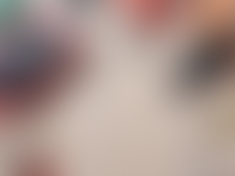 Tools on a wooden surface, including a red multimeter displaying 0.002, pliers, wire stripper, and screwdrivers. Green tape visible.