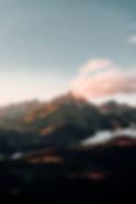 snow-covered-mountain-cloudy-sky-daytime.jpg