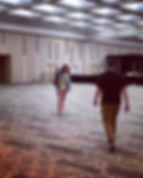 Kyle & Kuyper walking in opposite directions at the empty Nintendo Live que