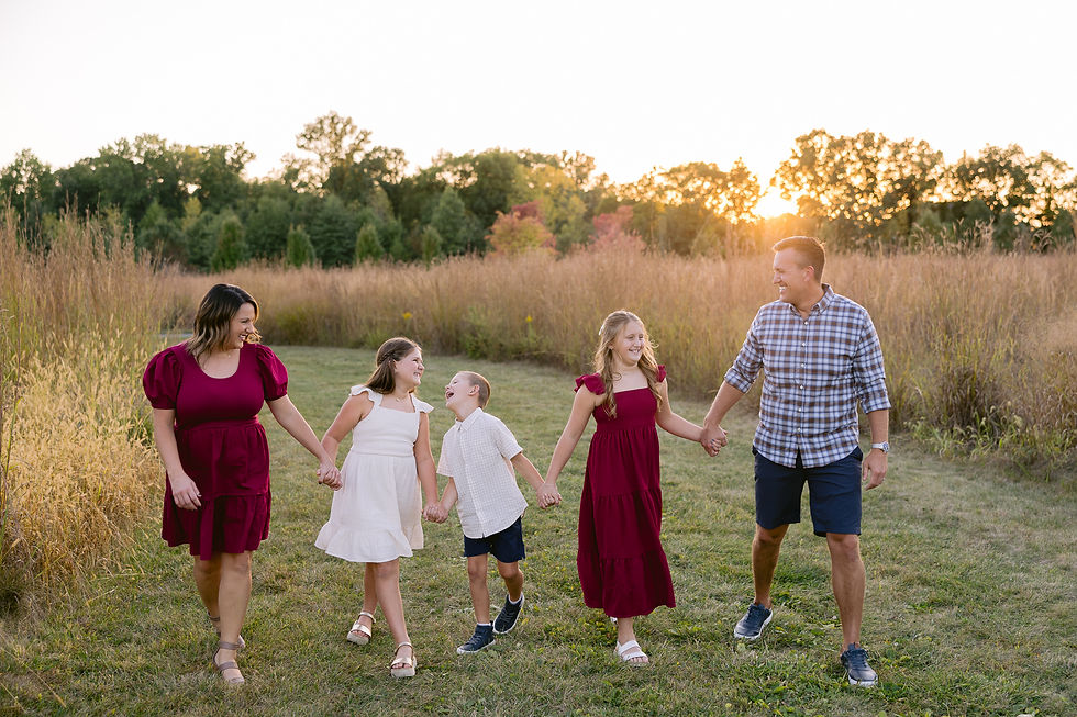 Fall family photo at West Park in Carmel surrounded by golden fields