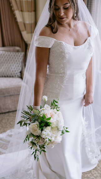 Modern yet timeless bridal portrait in The Conrad captured by a wedding photographer near me.