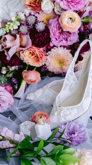 Luxury wedding floral arrangements bringing color and texture to Regions Tower reception space