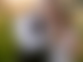 Bride and groom walk hand in hand through the vineyard at golden hour during their Sycamore at Mallow Run wedding in Bargersville, Indiana.