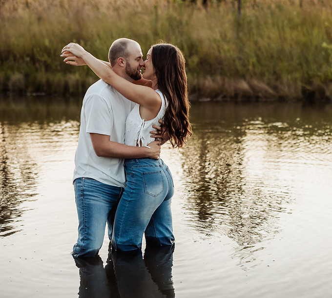 Candid engagement photos of a couple in downtown Indianapolis