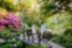 engagement photos at Newfields greenhouse with natural light and greenery