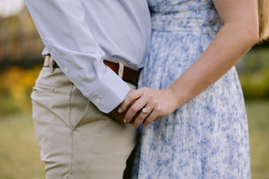 Geist Park engagement photos in Fishers Indiana featuring a couple walking along a wooded trail during a natural outdoor session captured by a Fishers engagement photographer.