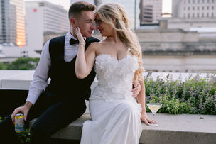 Elegant documentary-style wedding photography at Regions Tower in downtown Indianapolis featuring candid moments, city skyline views, and timeless black-tie celebration details.
