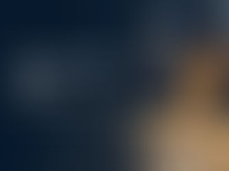 All Saints Day graphic with an open Bible and lit candle on a communion table in a dark blue sanctuary.