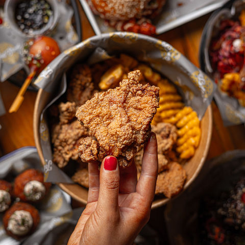 A piece of buttermilk fried chicken thigh at Thief Street