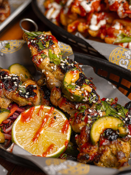 Thief Street side dish of Yakitori chicken skewers. Japanese street food