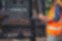 workers-standing-checking-beside-working-oil-pumps.jpg