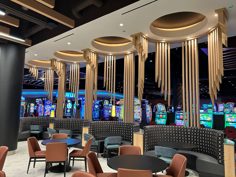 Casino, hospitality casework, native design, booth, restaurant casework, woodworking, headdress slat wall