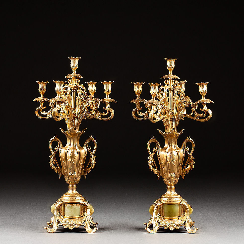 Thumbnail: A pair of zinc candelabra with marble on its base