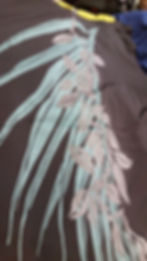 silver maile over palm