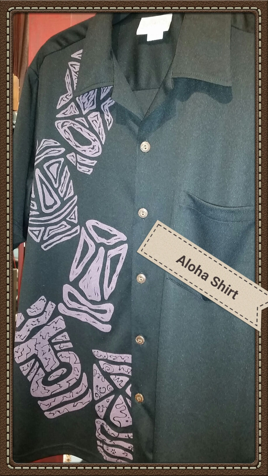 pink tikis on black aloha shirt