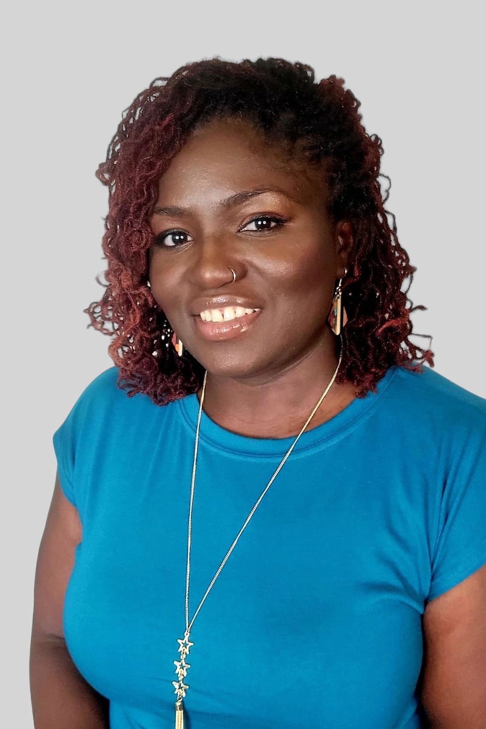 Tomi Monroe Headshot_edited.jpg