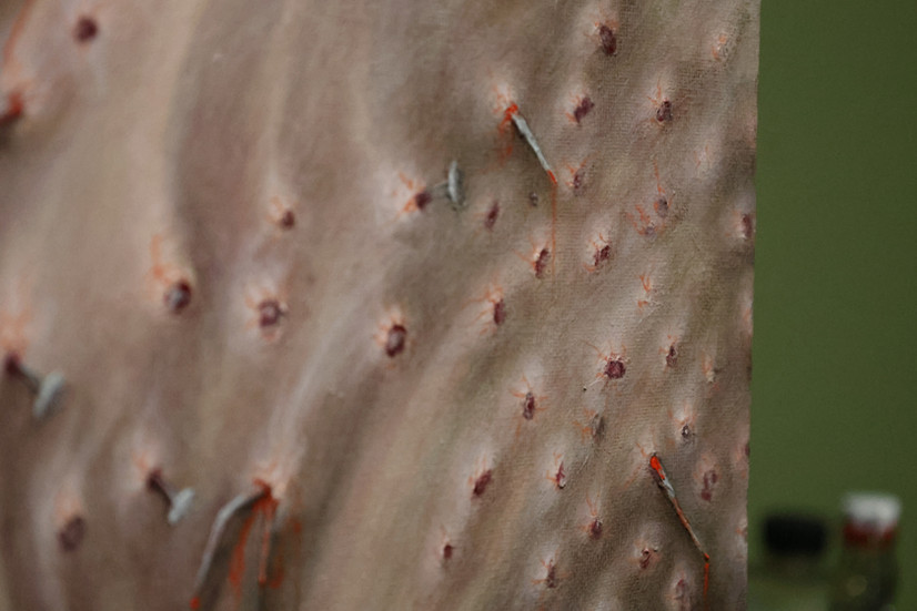 Detail of “Sardonic Smile” by Katerina Miller – hyperrealistic dark art oil painting showing nails piercing human flesh with red wounds and bruising, symbolic surrealist contemporary art.