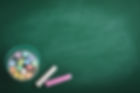 color-chalk-pencil-on-green-school-board-concept-2025-03-27-00-53-52-utc.jpg