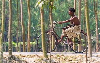 A local cyclist in rural Bangladesh