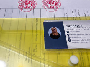 completed california apostille and business card of Tifini