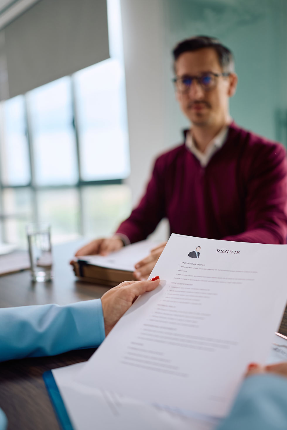 An HR woman reviews an application