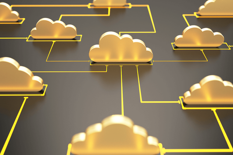 Network of golden 3D clouds interconnected by yellow lines and pathways on a dark gray background, illustrating cloud computing infrastructure, distributed cloud systems, or cloud storage connectivity.