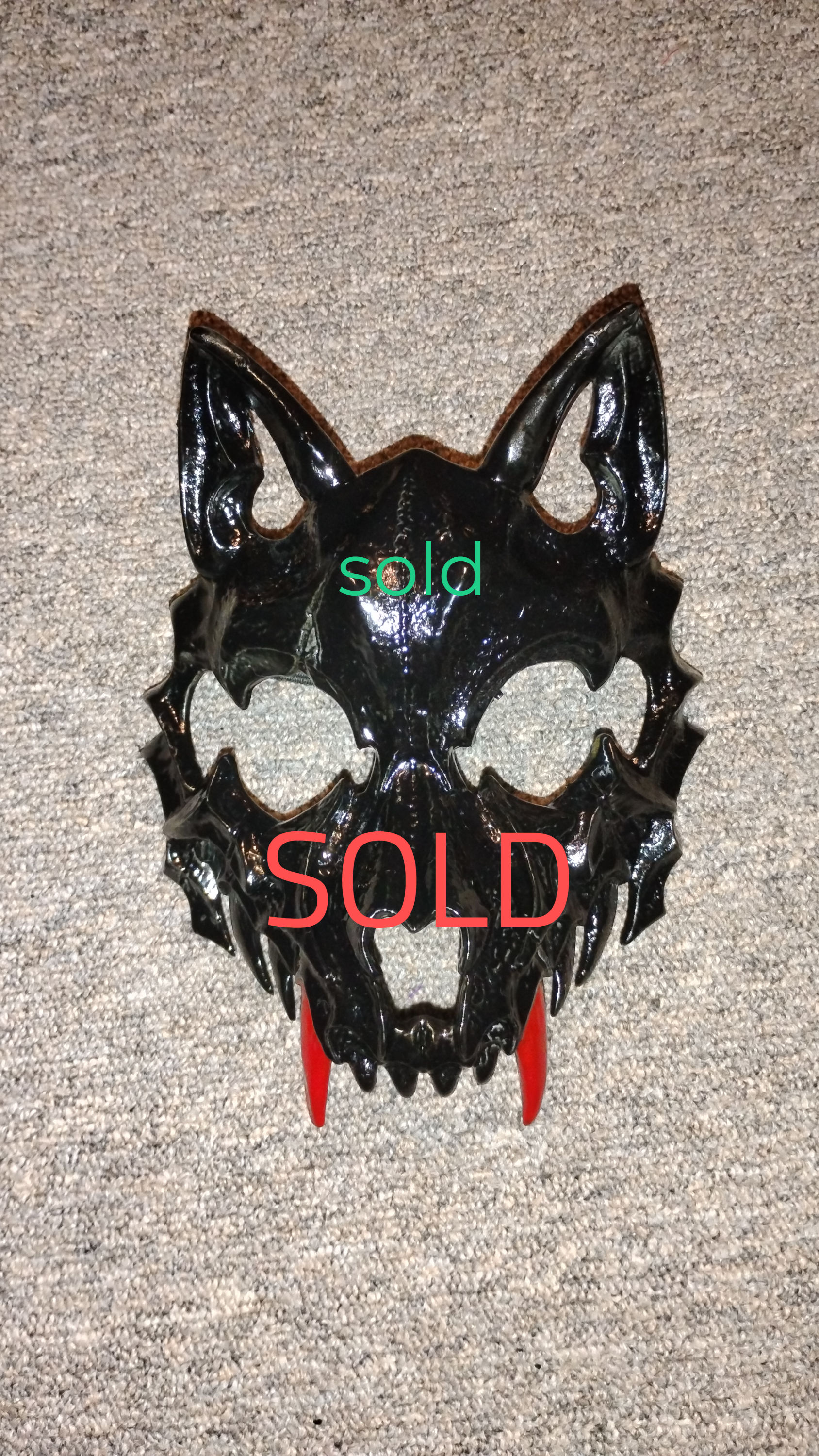 RED FANGED BLACK WOLF