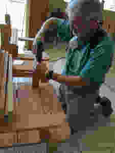 Team member Keith Greene, of St. Simons on the Sound, Ft. Walton Beach, FL is working on the new clergy chairs for Iglesia Santo Tomas.