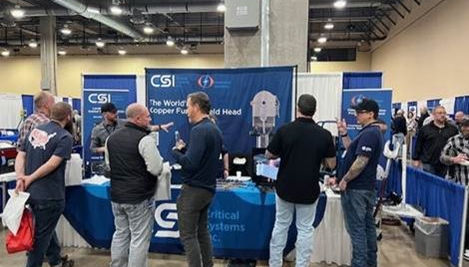 The CSI Red Metal Copper Welding Team at their booth.