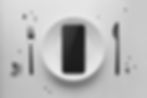 Smartphone on white plate with fork and knife_edited.jpg