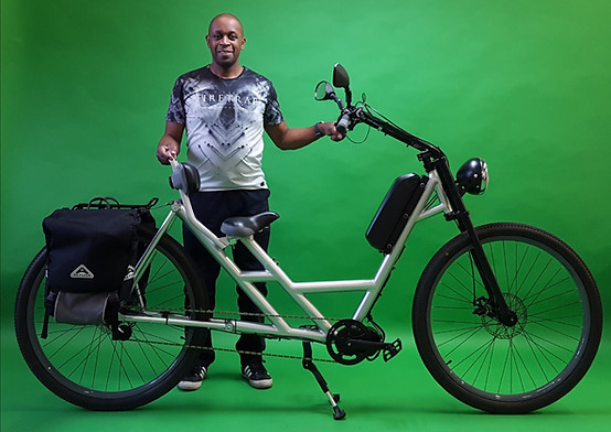 Man 5ft 9" standing with Titan Vanguard E- Cargo Bike