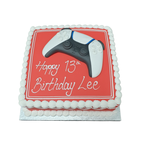 Bespoke PS5 controller cake with detailed buttons and joysticks, crafted for celebration in Solihull, West Midlands.