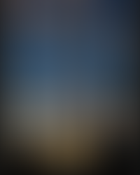 Two photos spliced together. One is of the sun setting with pink, rose, and peach colored clouds with a rich cobalt sky. The other is a black and white photo of the waning crescent moon and Jupiter.