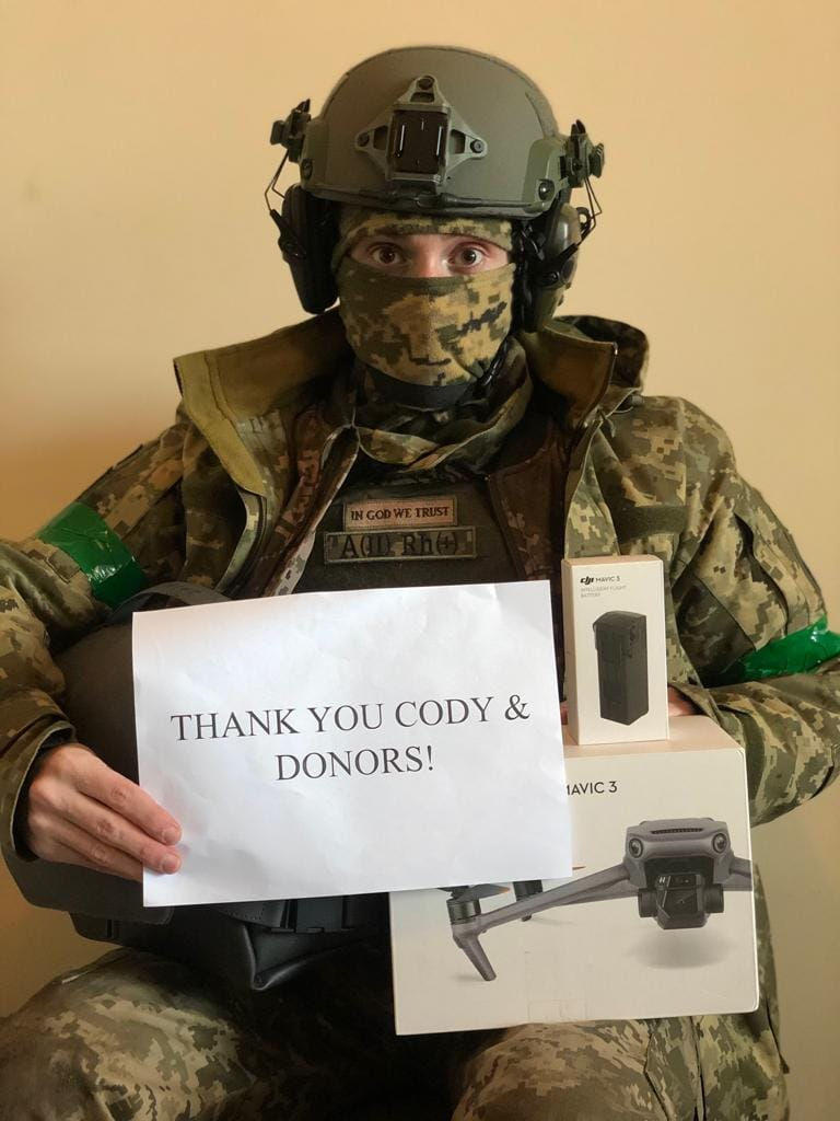 A Ukrainian Soldier posing with a DJI Drone thanking Cody Langford and Donors for their support.