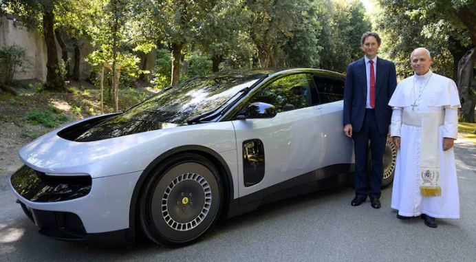 Pope Leo XIV examines Ferrari’s futuristic Luce electric vehicle during a Vatican presentation.