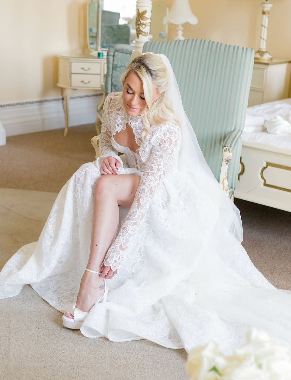 Rebecca wearing Aquazzura bridal shoes 