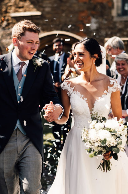 Real bride Therese wearing Suzanne Neville bridal dress. Bride alterations By Brooke in Wiltshire,