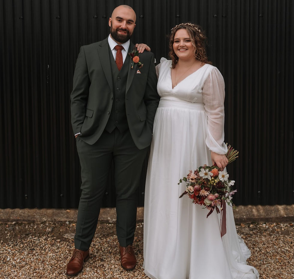 Rosie wearing her bespoke wedding dress By Brooke for her autumnal wedding