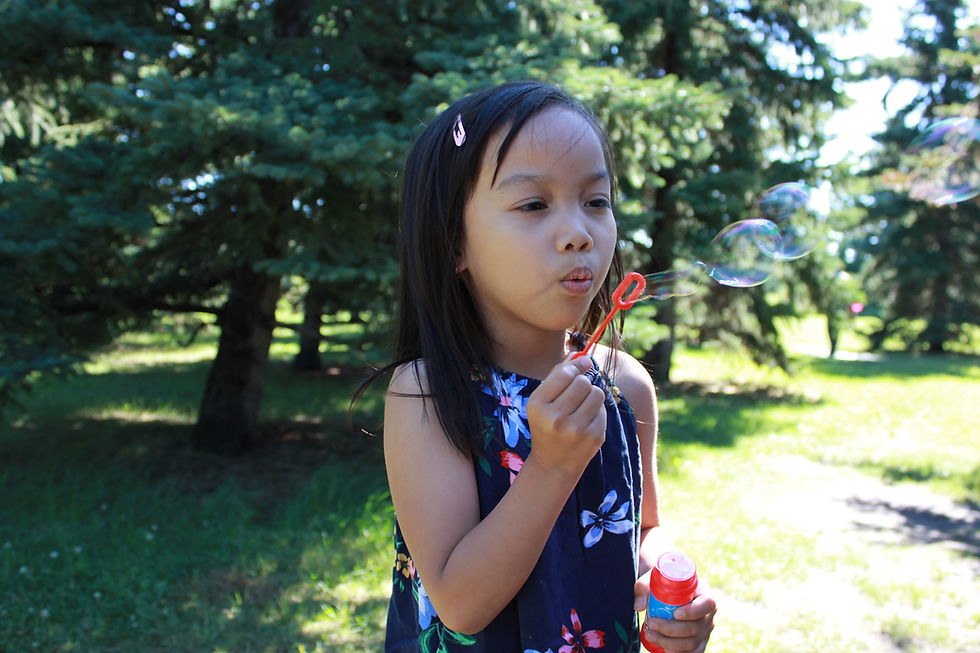 A child enjoying open-air activities organized by the NE Hub