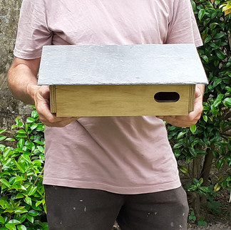 Man holding a Swift Box in front of him.