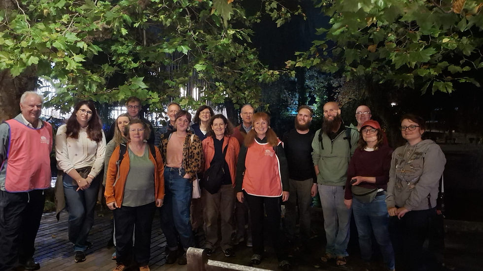 A group of people under a tree who attended the Bat Walk & Talk