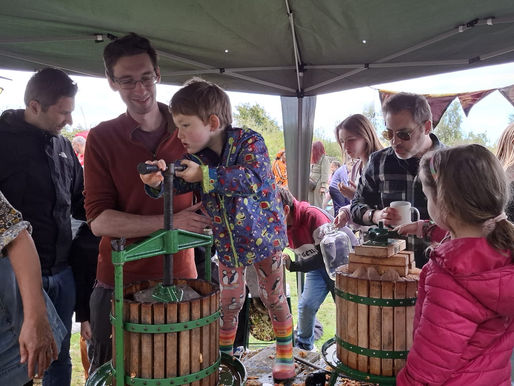 People apple pressing at Rosamund Community Garden
