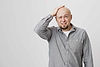 troubled-adult-bald-guy-hit-head-grimacing_11zon (1).jpg