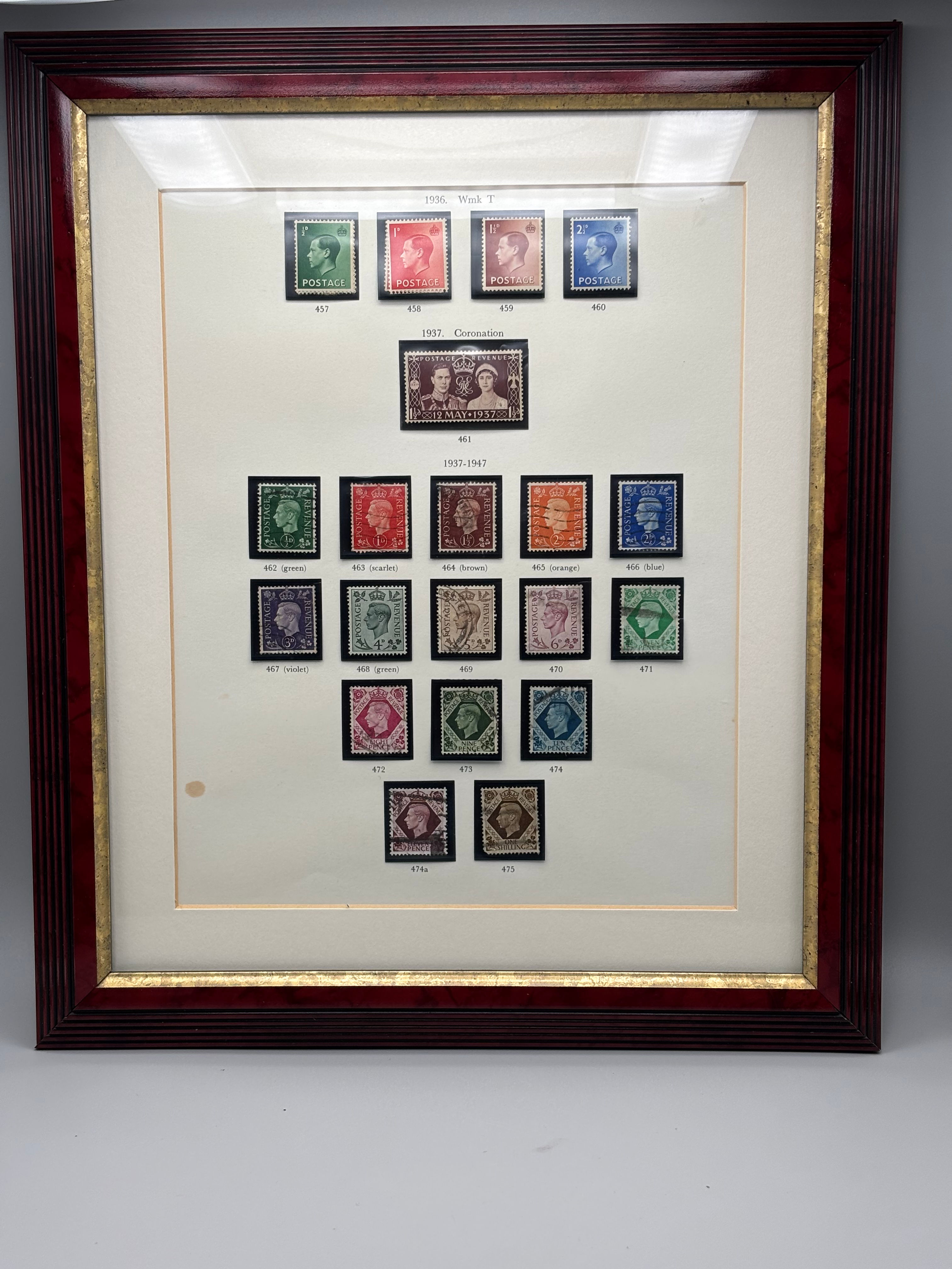Framed and cataloged collection of British postage stamps spanning 1936 to 1947.